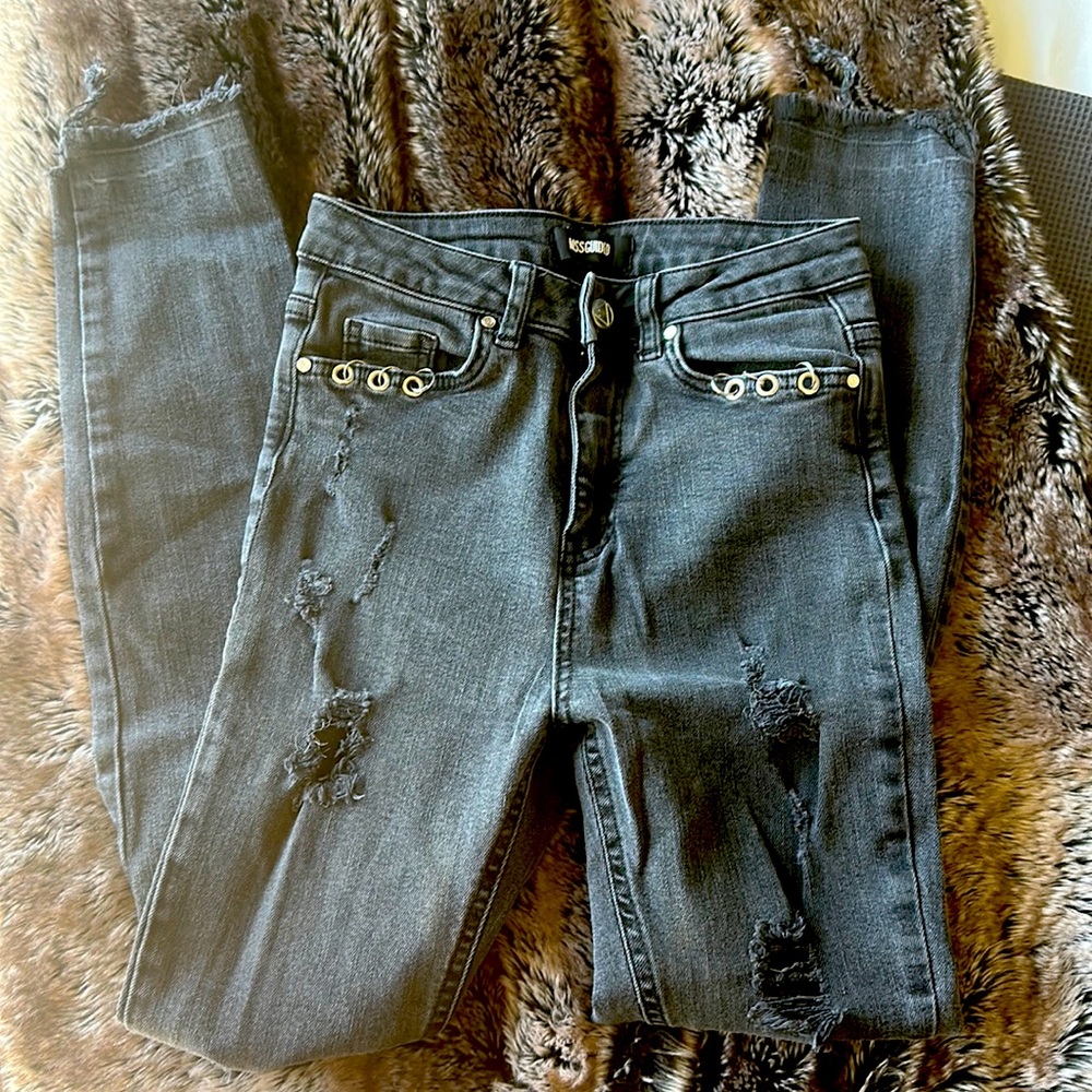 Skinny black denim jeans with loop detail